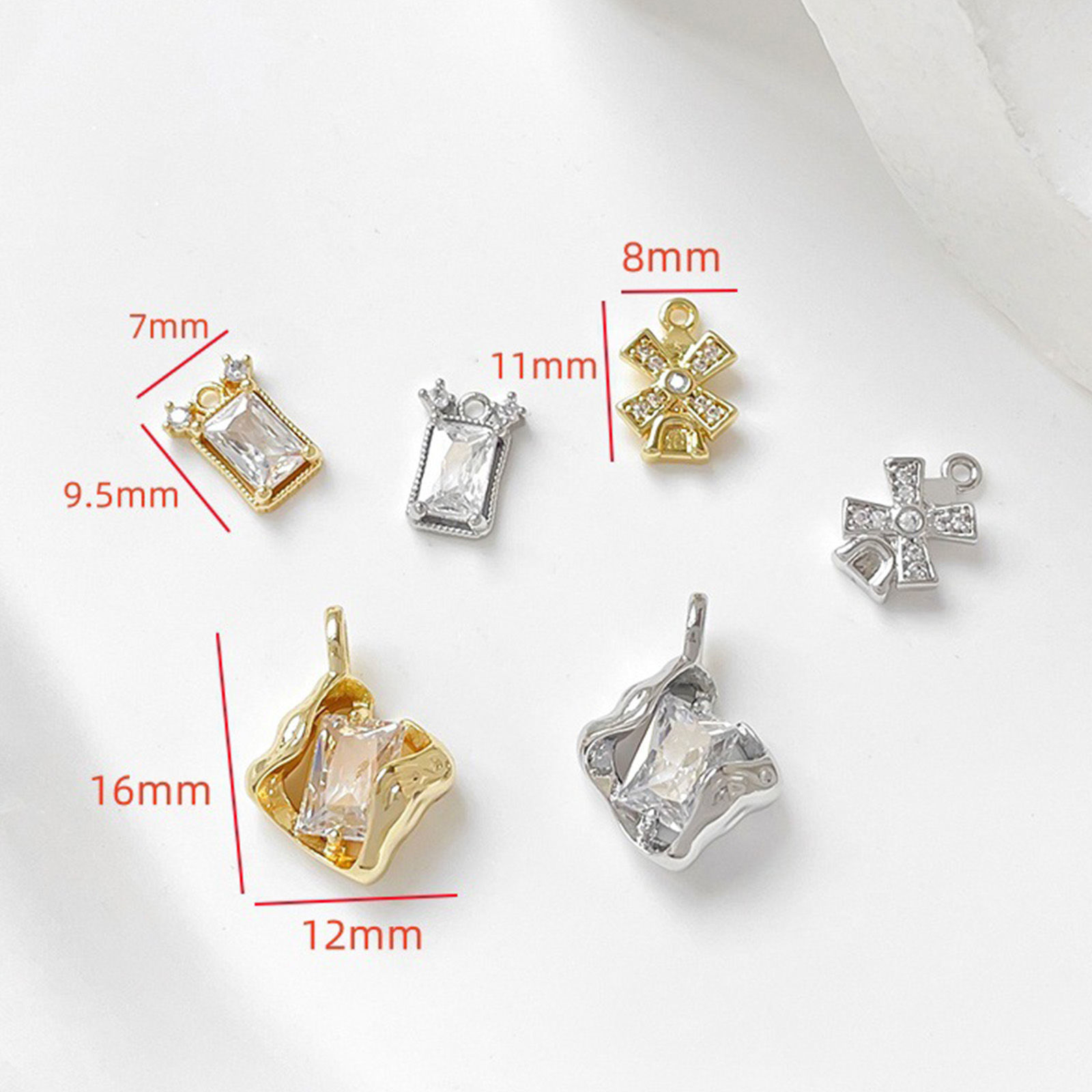 Picture of Brass Charms Multicolor Geometric Windmill Clear Cubic Zirconia