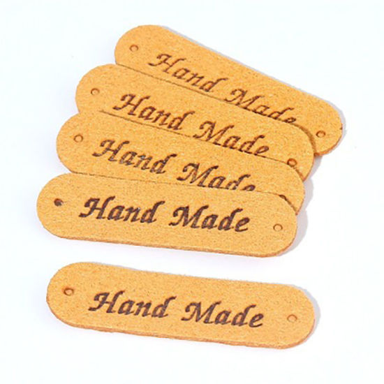 ポリウレタン ラベル 長方形 黄色 " Hand Made " 45mm x 12mm、 20 個 の画像