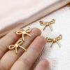 Picture of 2 PCs Eco-friendly 304 Stainless Steel Clothes Connectors Charms Pendants 18K Gold Plated Bowknot Hollow 19mm x 18mm
