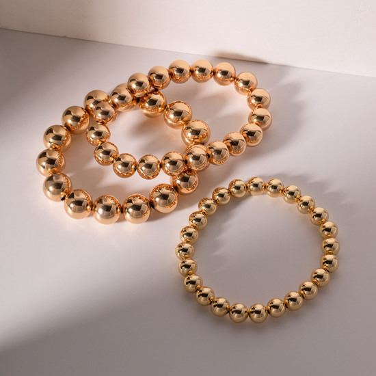 Image de Placage Sous Vide Écologique À la Mode Bracelets Raffinés Bracelets Délicats Bracelet de Perles Simple en Cuivre Plaqué Or Véritable 18K Balle Elastique Unisexe Fête 1 Pièce