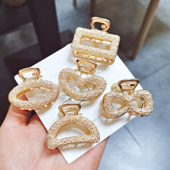 ヘアクリップ 金メッキ 楕円形 ローズ 45mm、 1 個 の画像